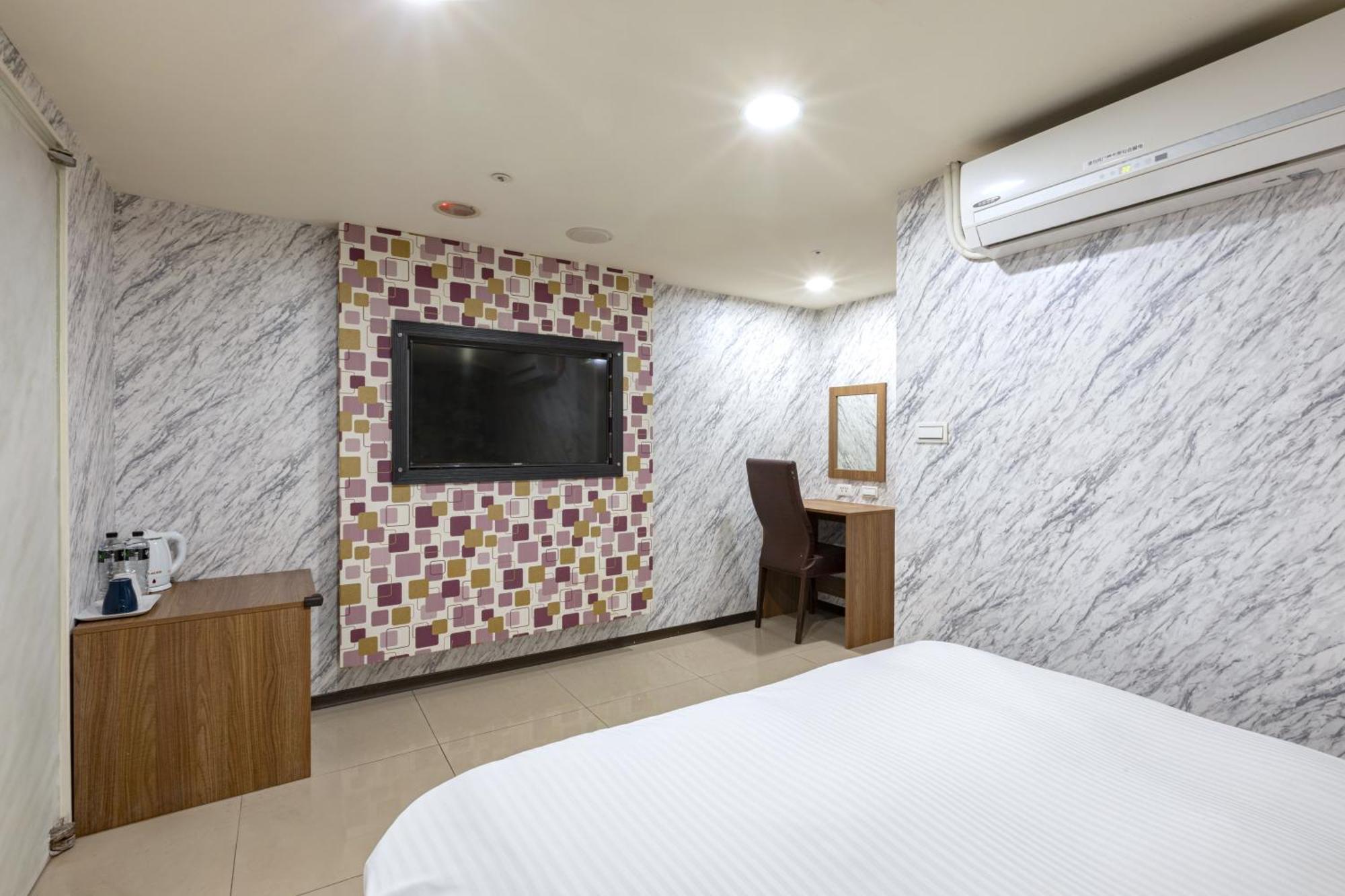 E Lim Hotel Zhongli Rum bild