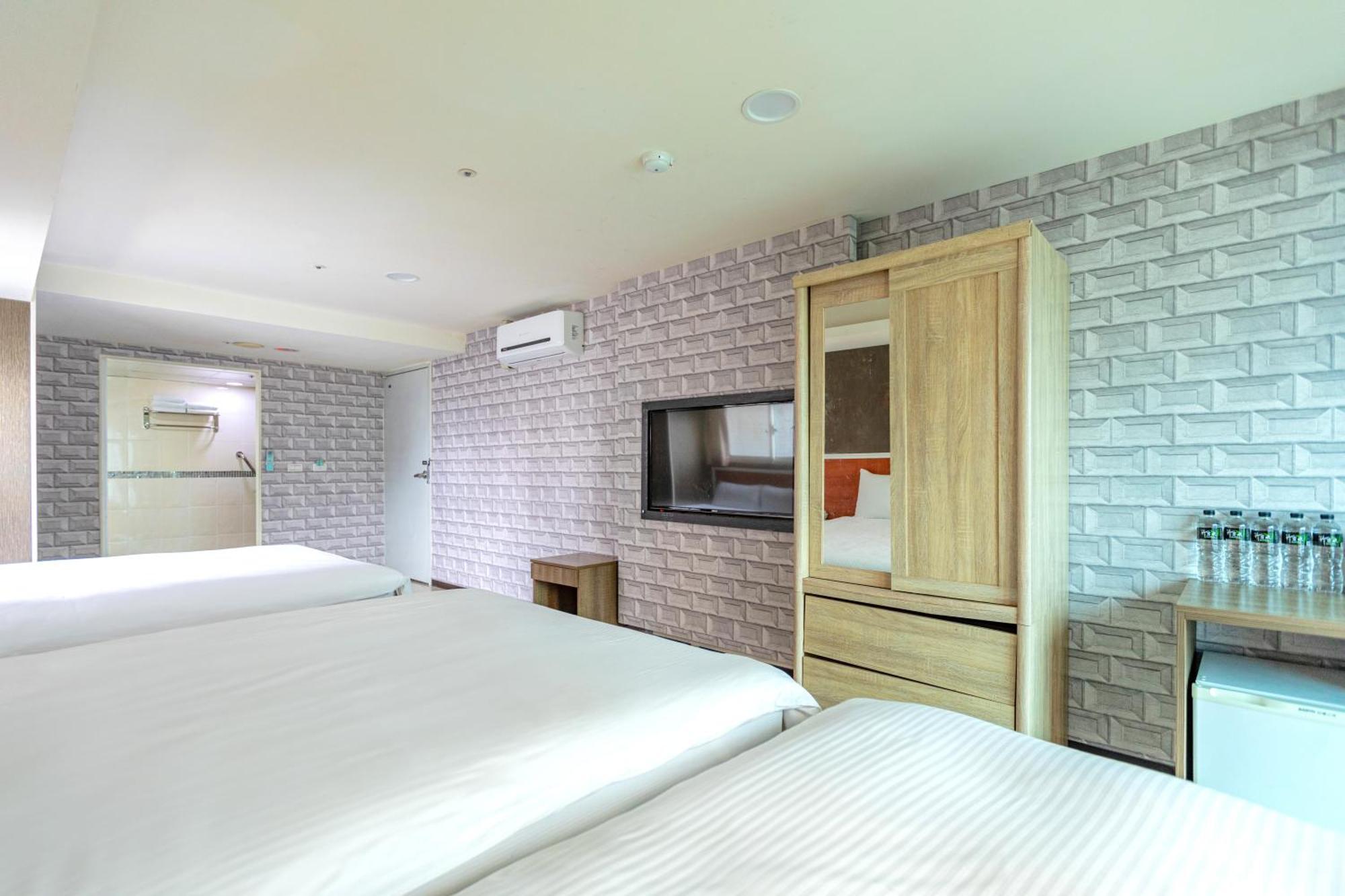 E Lim Hotel Zhongli Rum bild