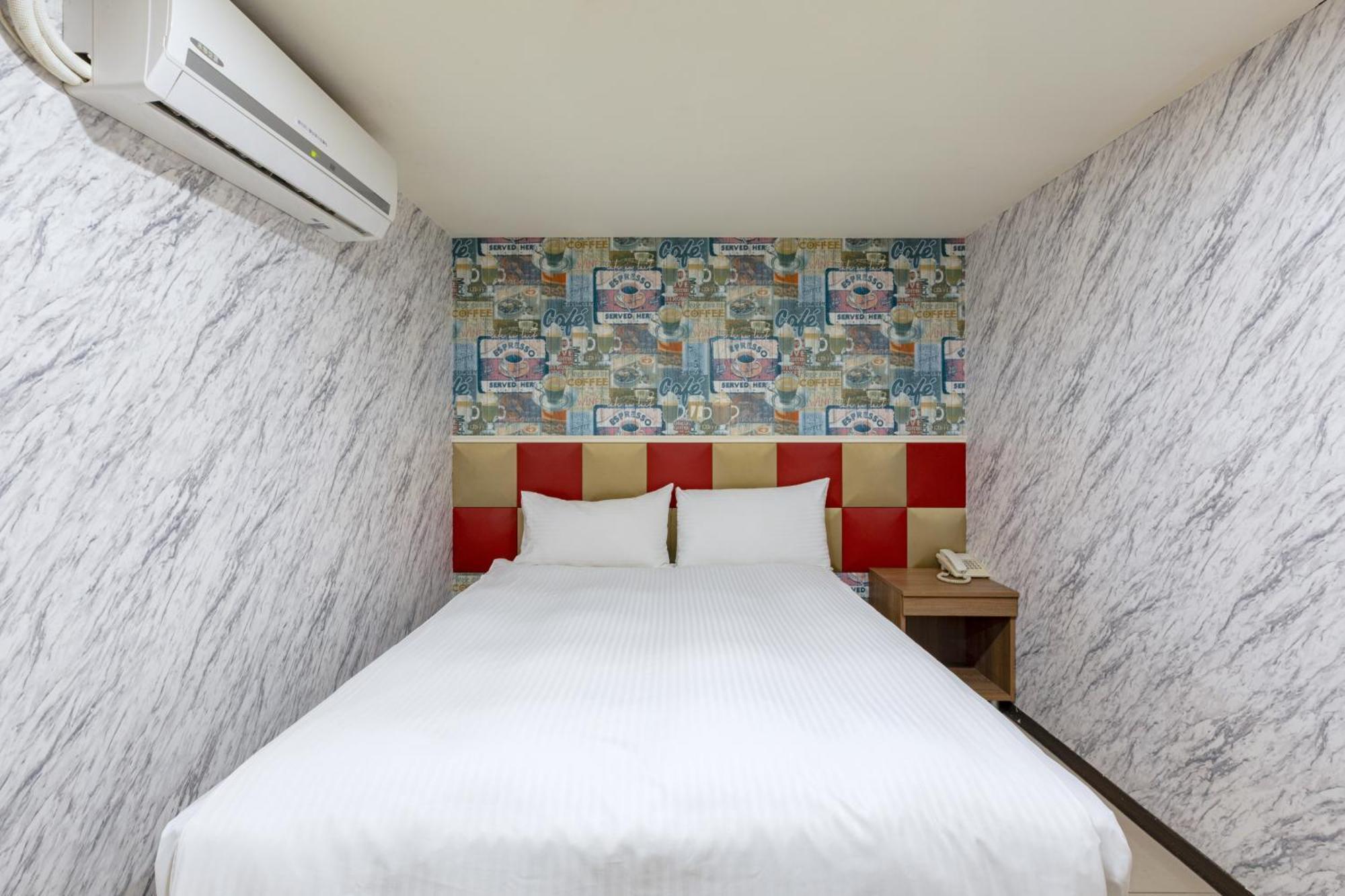 E Lim Hotel Zhongli Rum bild