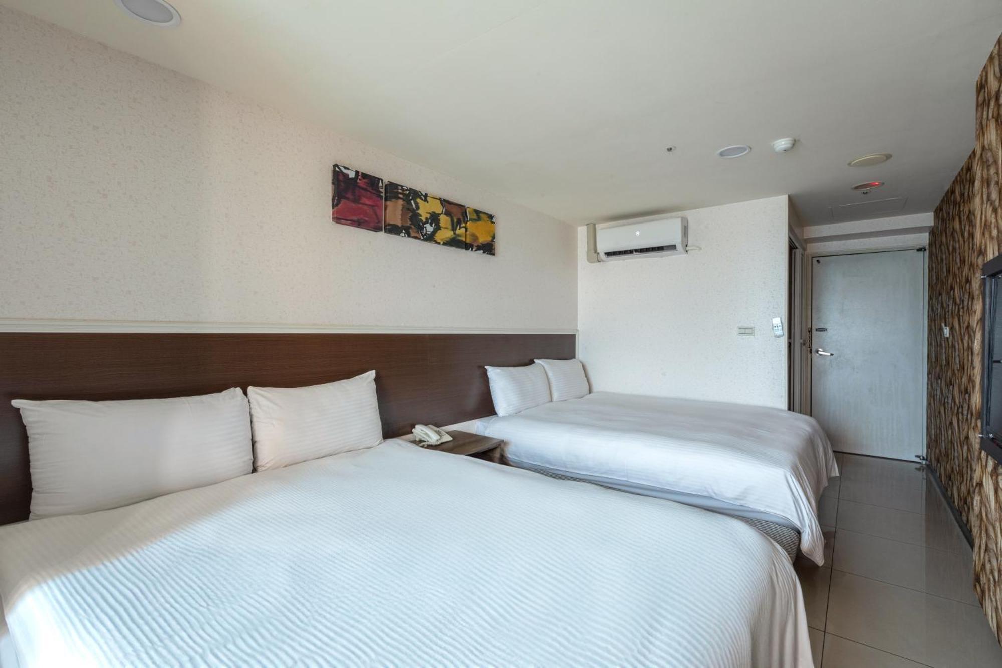 E Lim Hotel Zhongli Rum bild