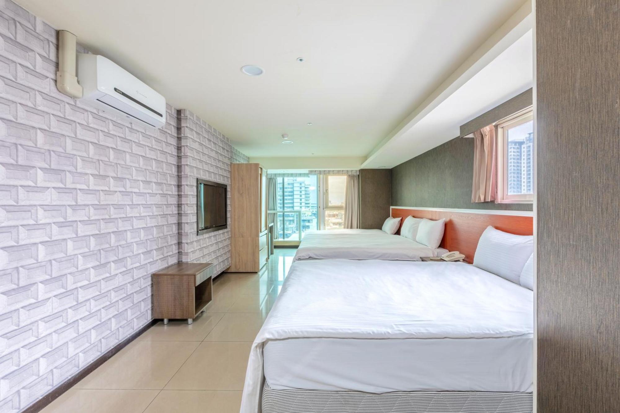 E Lim Hotel Zhongli Rum bild