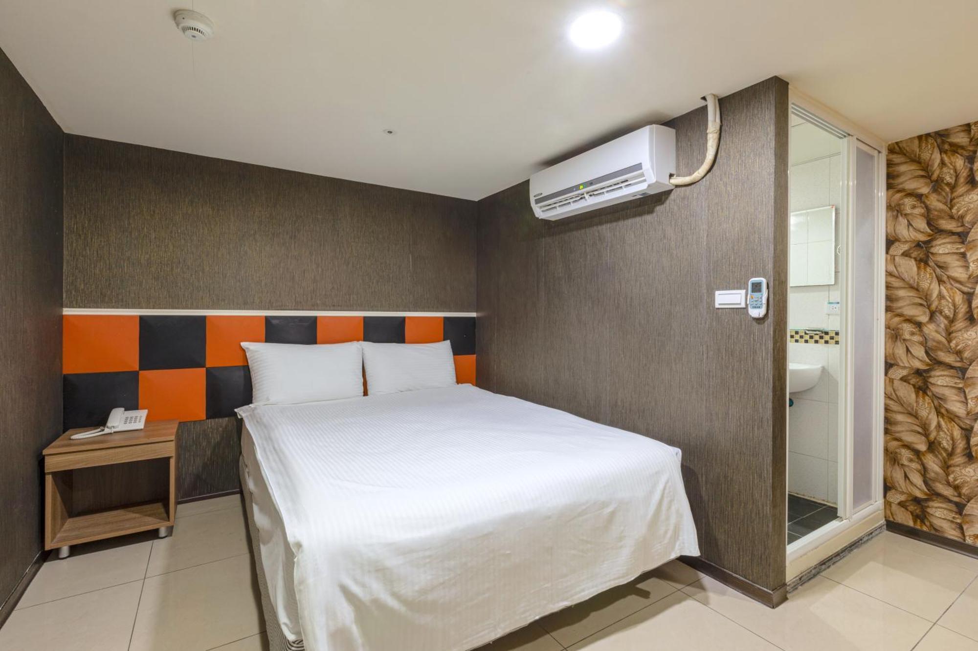 E Lim Hotel Zhongli Rum bild