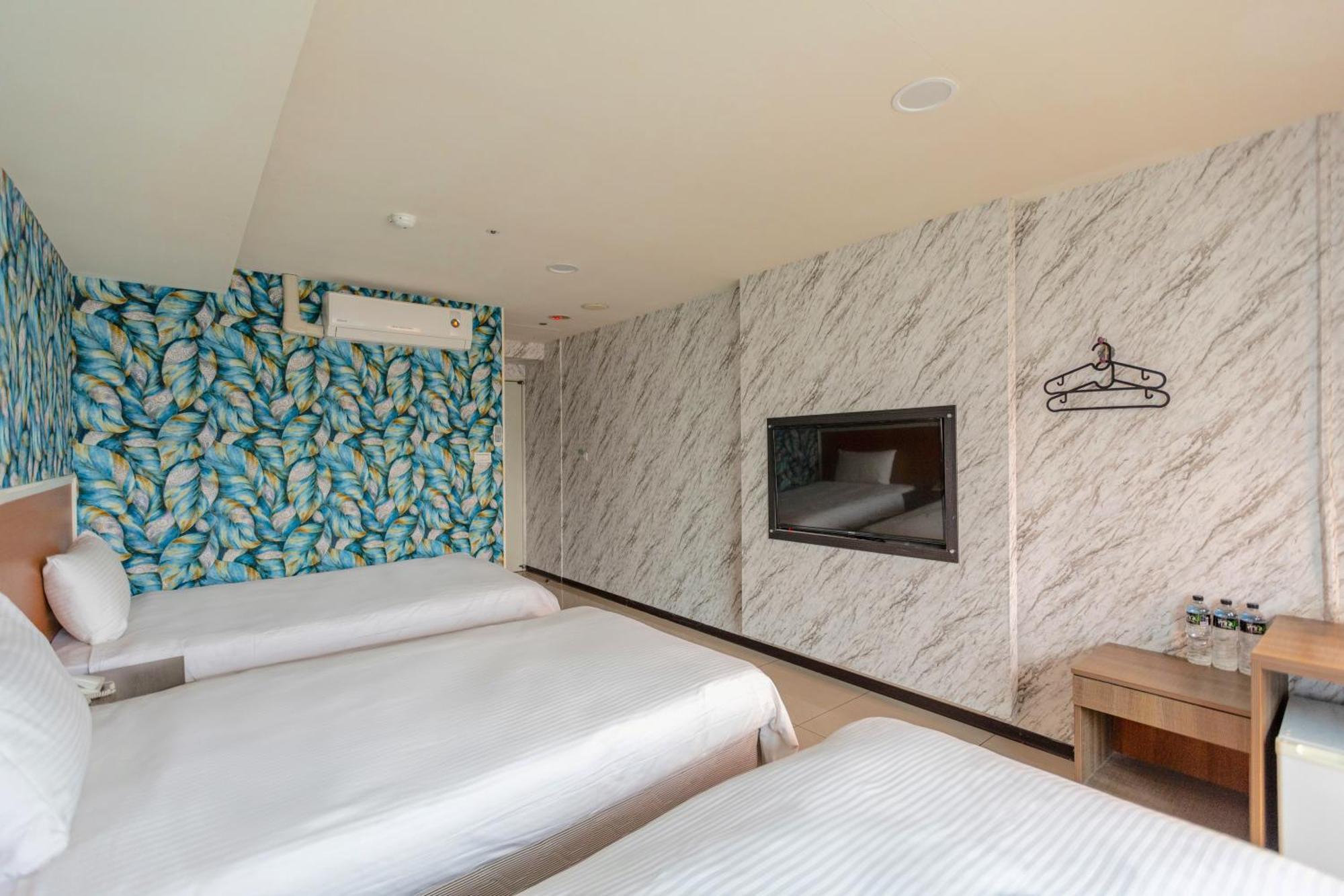 E Lim Hotel Zhongli Rum bild