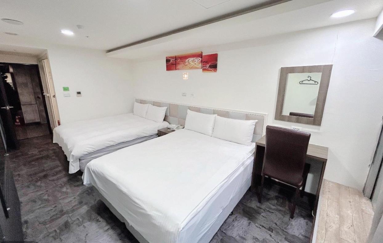 E Lim Hotel Zhongli Rum bild
